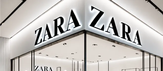 The glass storefront of a fashion store in a shopping centre
